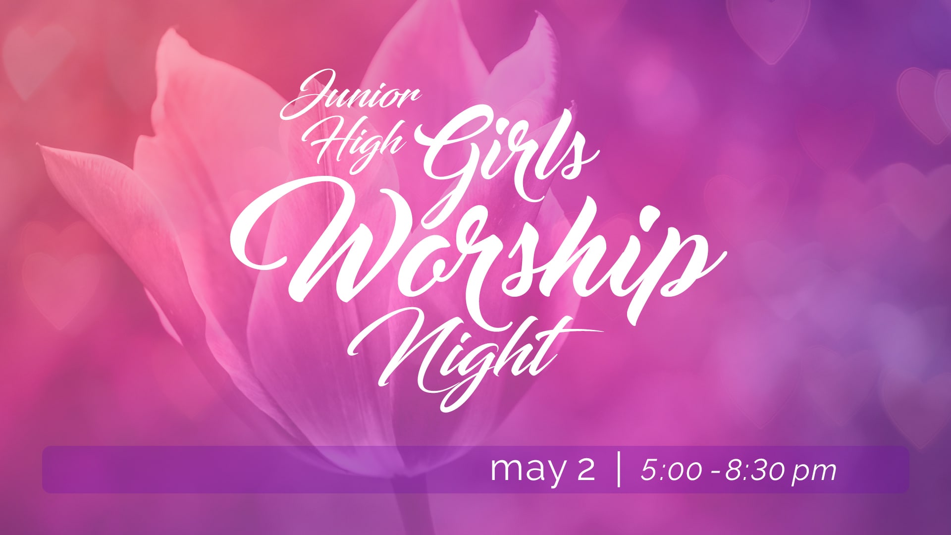 Junior High girls gathered together in a modern worship setting with uplifted hands and bright lighting.