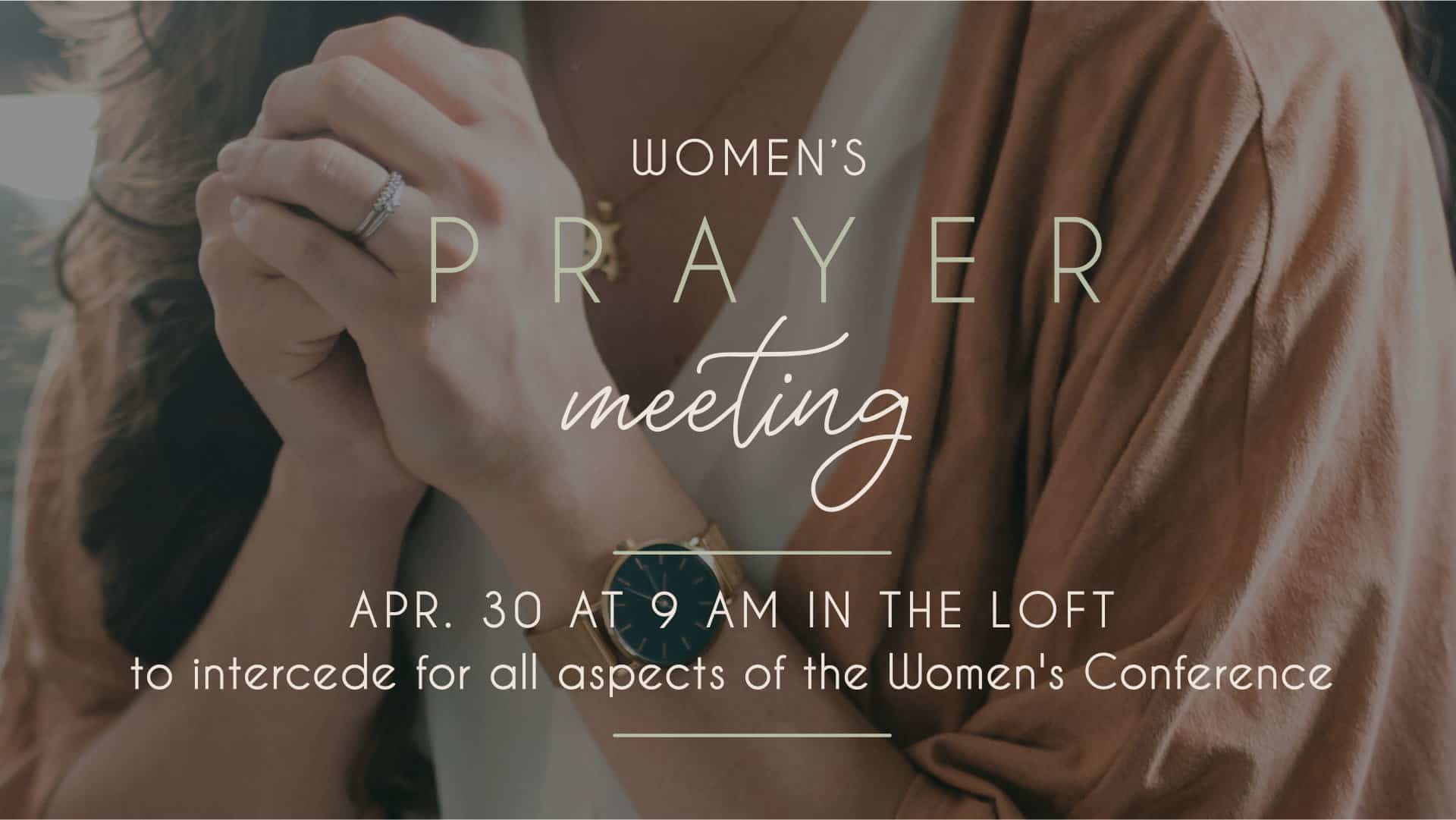 Women gathered in prayer at The Loft, interceding for the upcoming Surrender conference.